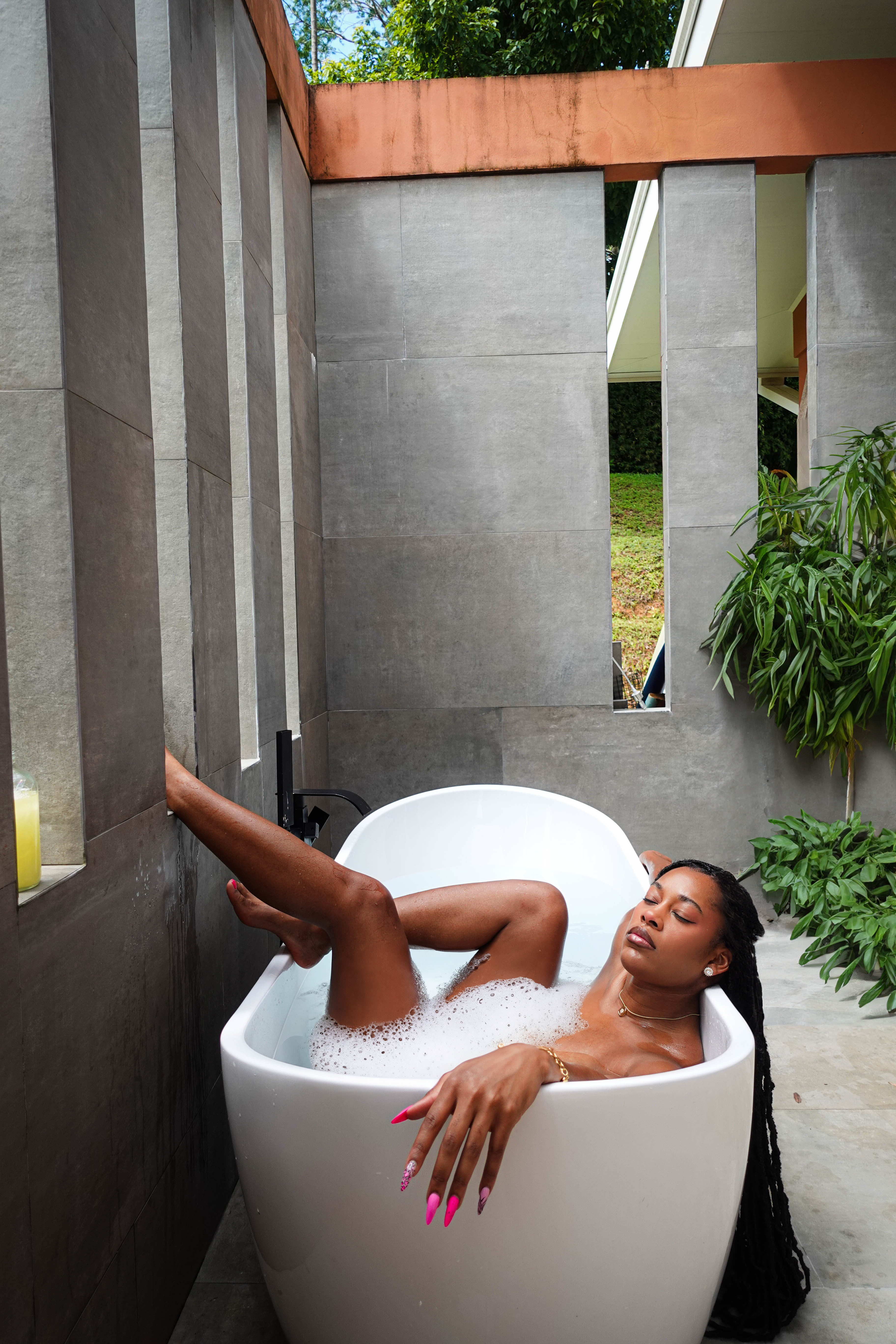 This Costa Rican bath editorial captures tropical light, natural skin texture, and luxury resort energy. Shot during golden hour, this series highlights soft glow editing and high-end campaign aesthetics.